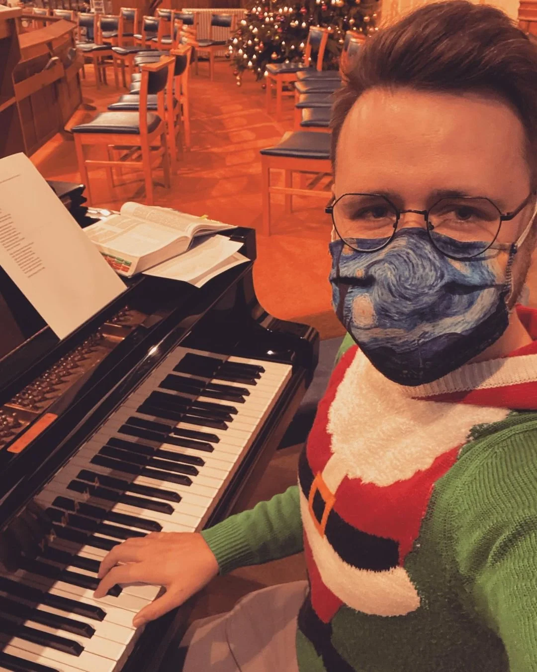 Ministry Development Officer Gary Hopkins at the piano for Queer Carols at Wylde Green URC, Birmingham which now hosts the Open Table Birmingham community.