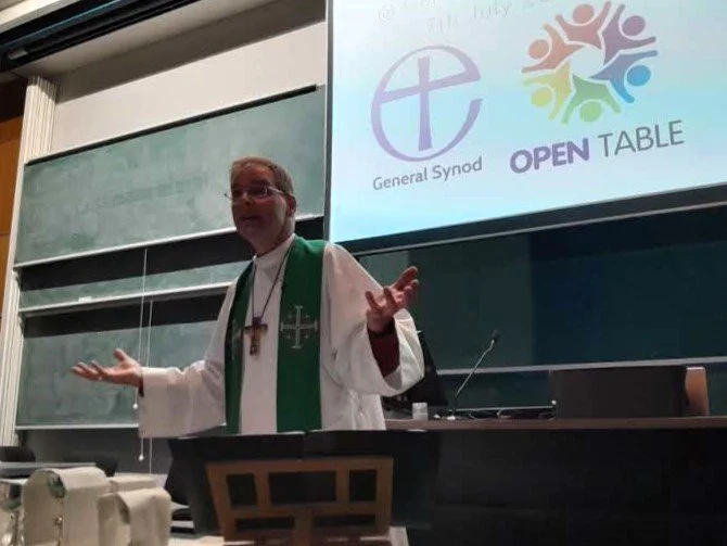 BISHOP OF BRADFORD Toby Howarth celebrating an Open Table communion at the close of the Church of England General Synod Gender and Sexuality Group on Friday 7th July.