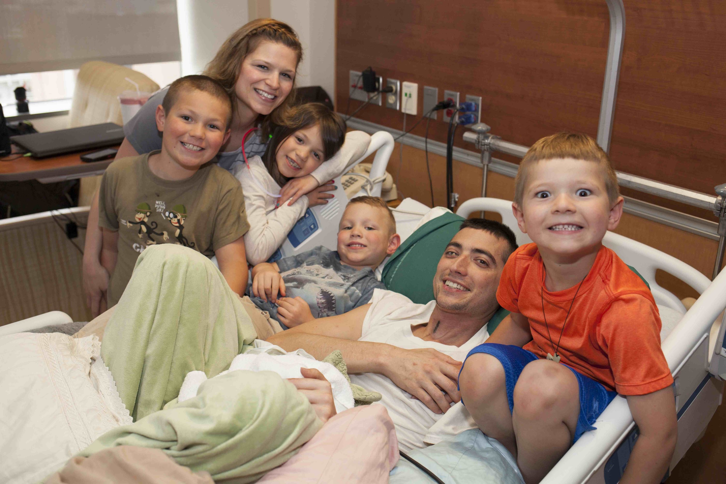 David and Christine, with their children: Ethan (9), Anna (7), Titus (6) and Zach (4)