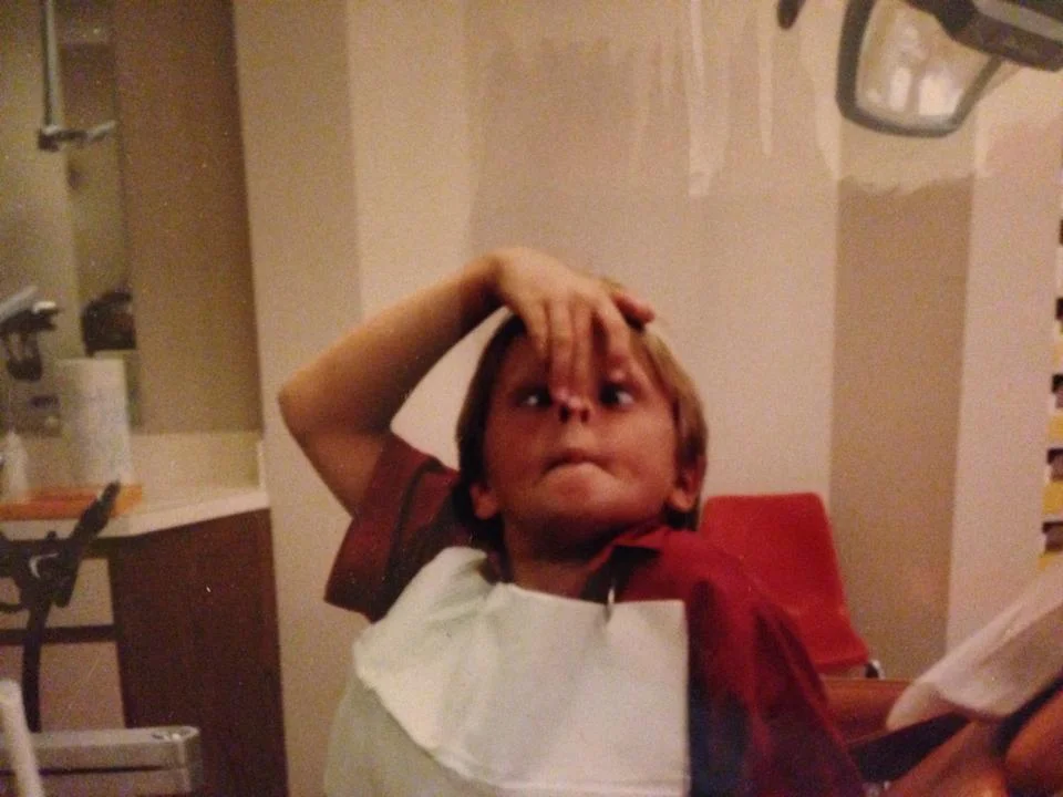 Dr. Kev at one of his own pediatric dental visits, showing the legendary professionalism that would become his trademark.