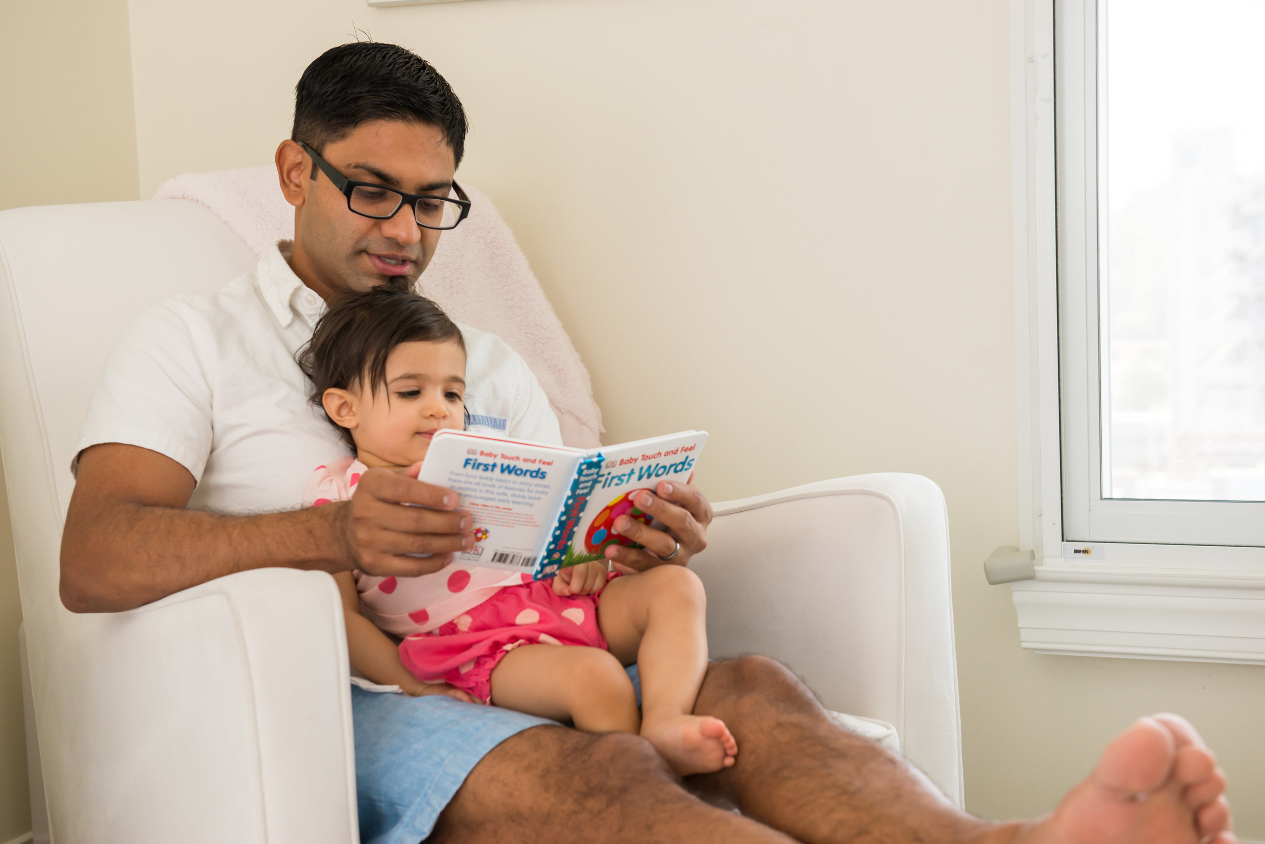 Father and daughter reading