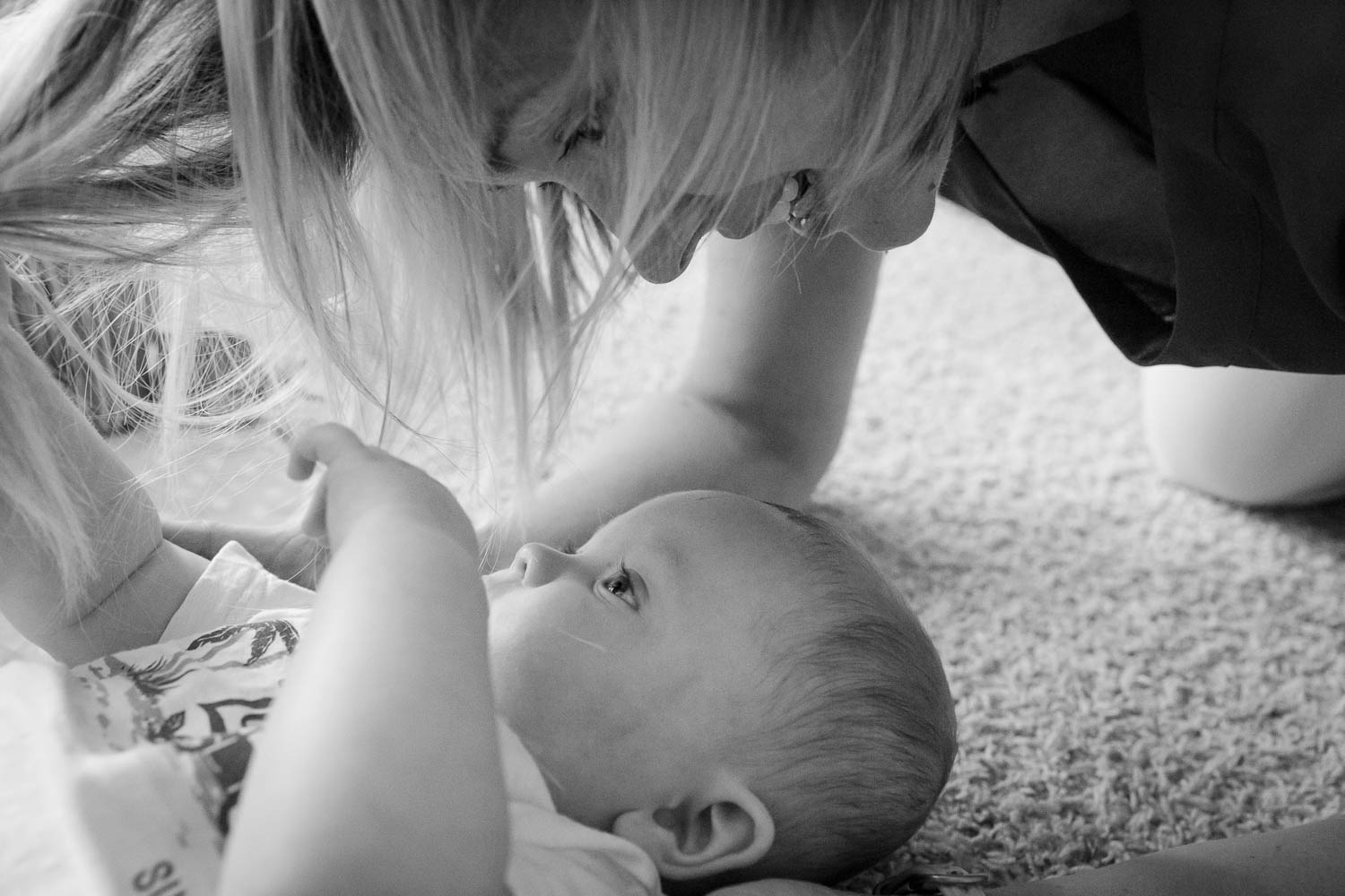 Mother and baby on the floor