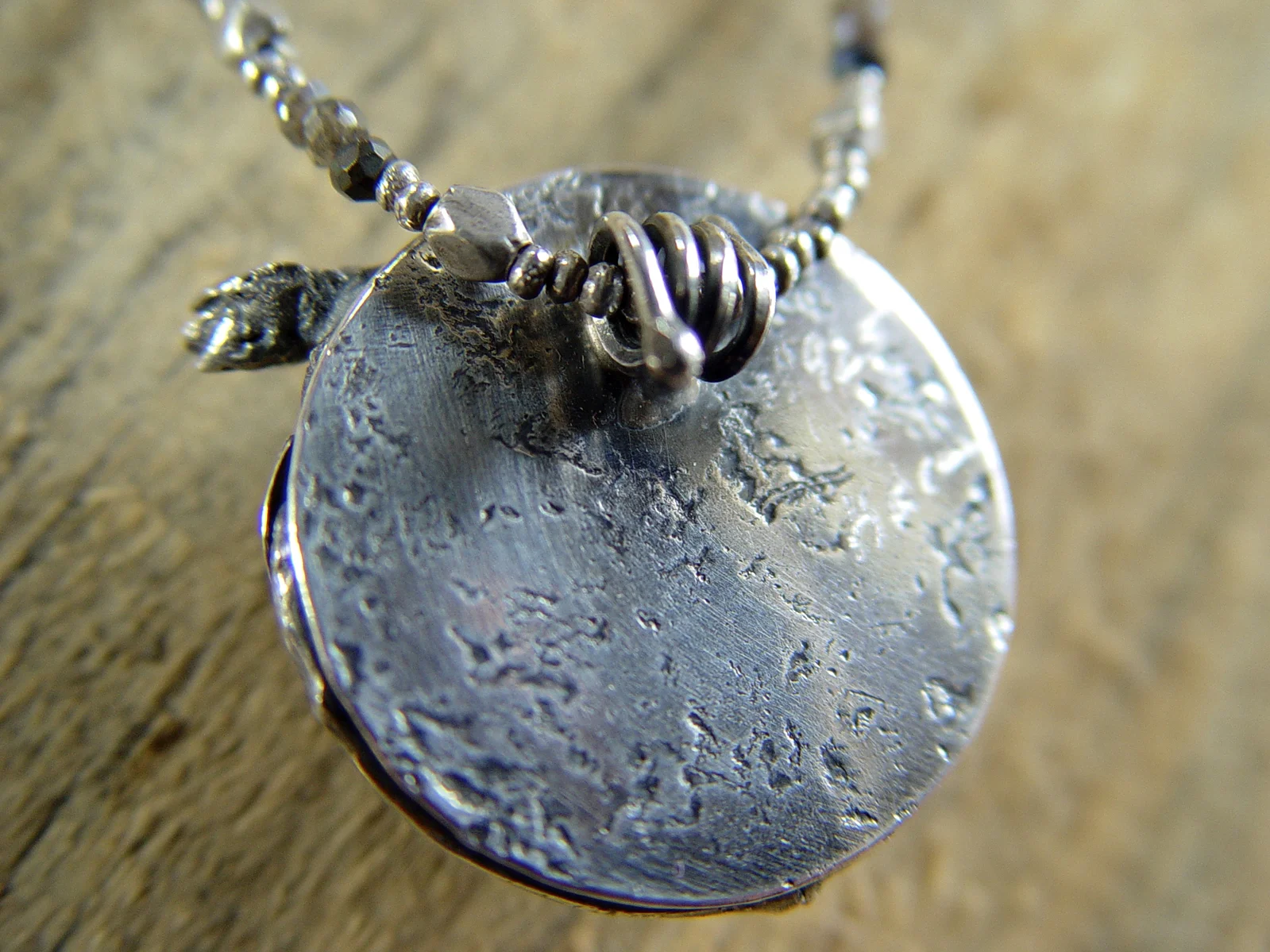 labradorite_botanical_cedar_pod_twig_wax_casting_forged_sterling_silver_back.jpg