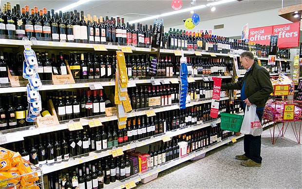 A typical UK supermarket with an old man (not Mr. Pie) clearly lost and confused as he's buying wine not whiskey