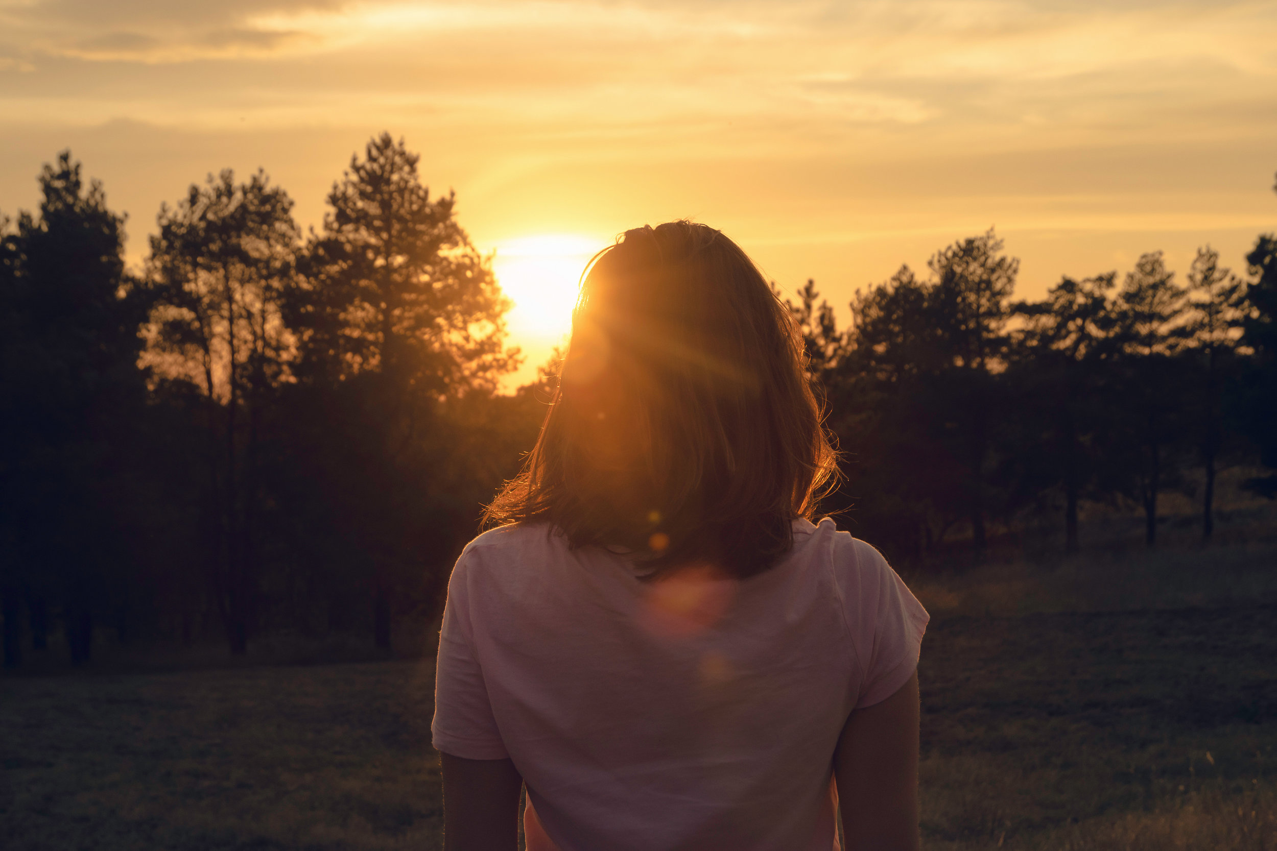 bigstock-Woman-In-Nature-In-Sunset-Peo-263236492.jpg