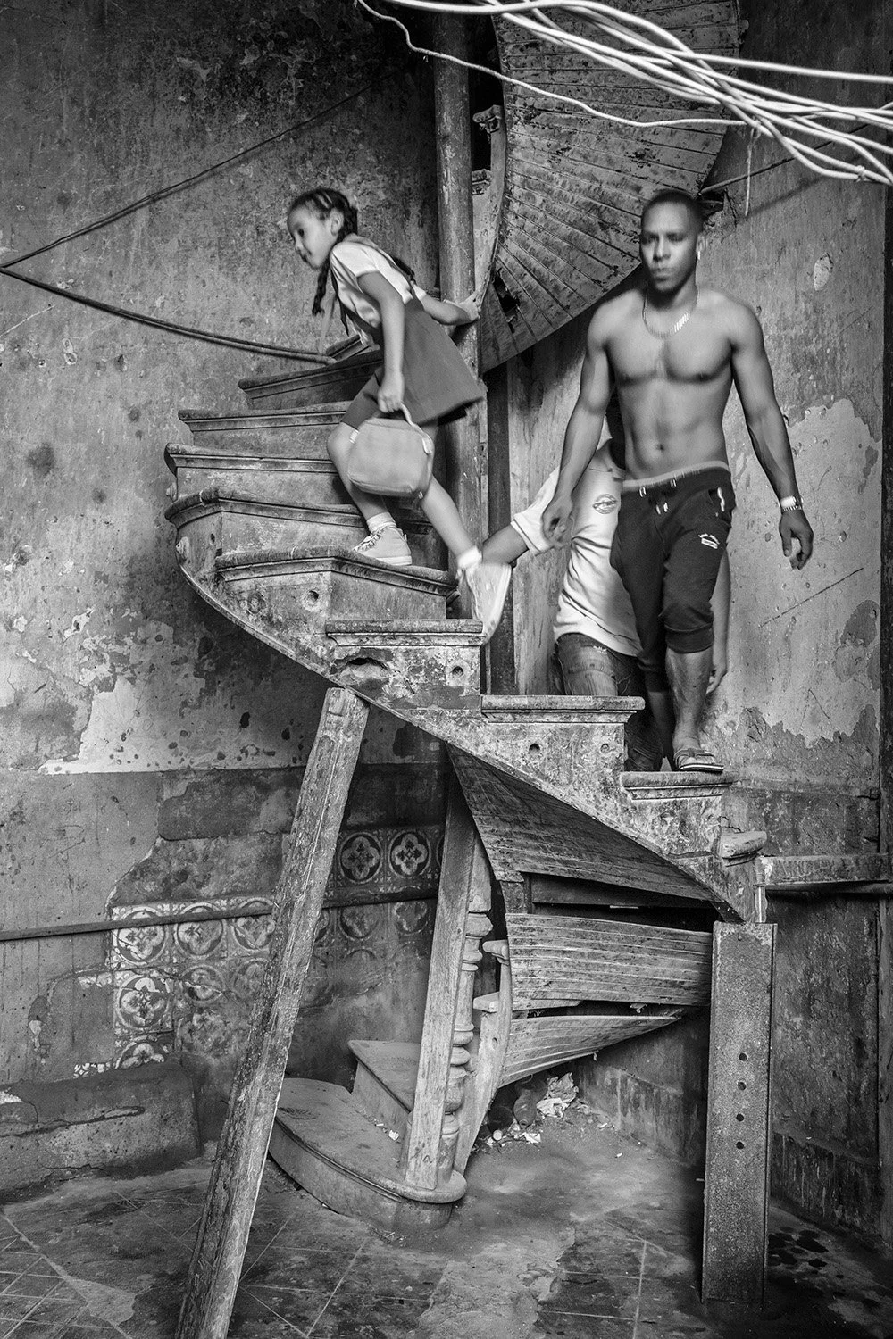 Father and daughter on unsafe staircase
Havana, Cuba 2012
Archival pigment print
Available in limited editions