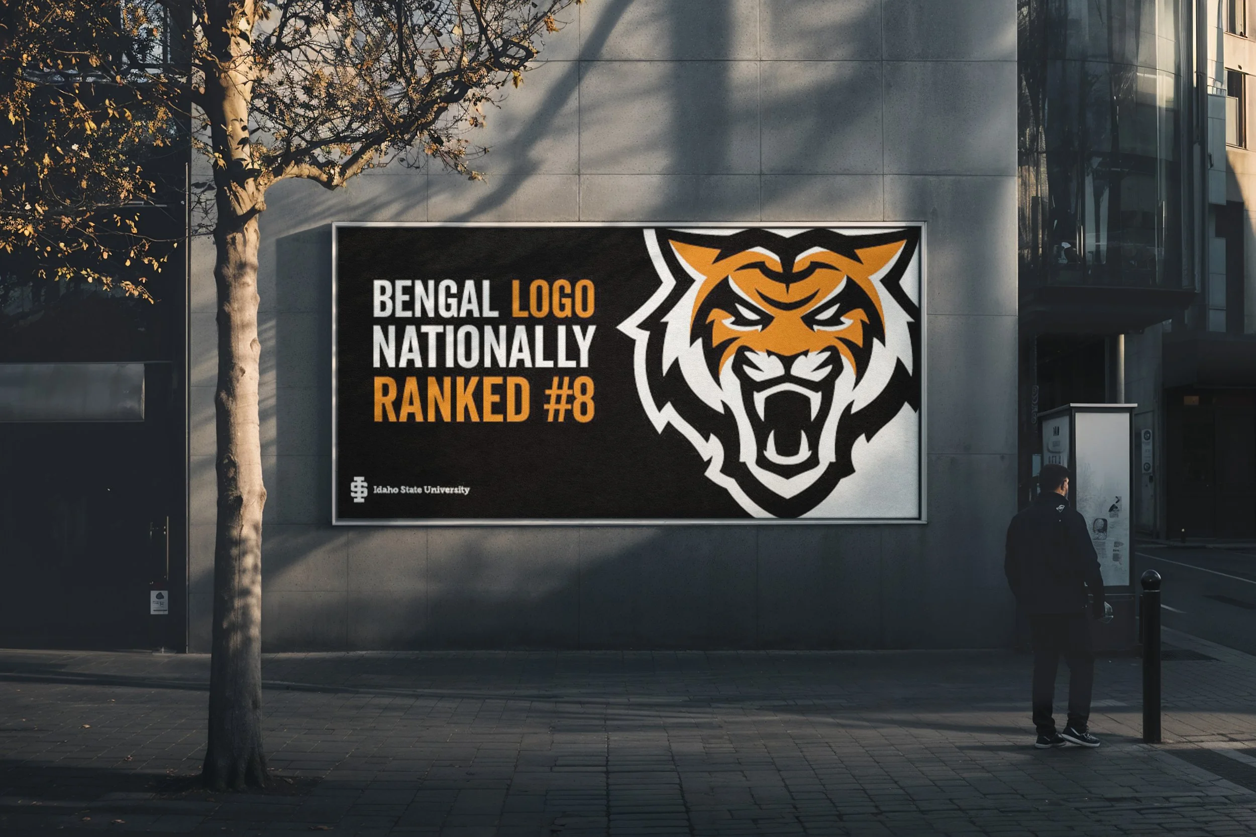 A billboard on a building wall featuring the Bengal logo, with the text 'Bengal logo nationally ranked #8', and the Idaho State University logo in the bottom left corner.