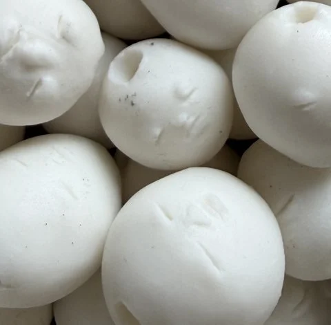 Moon Jar Faces Pile