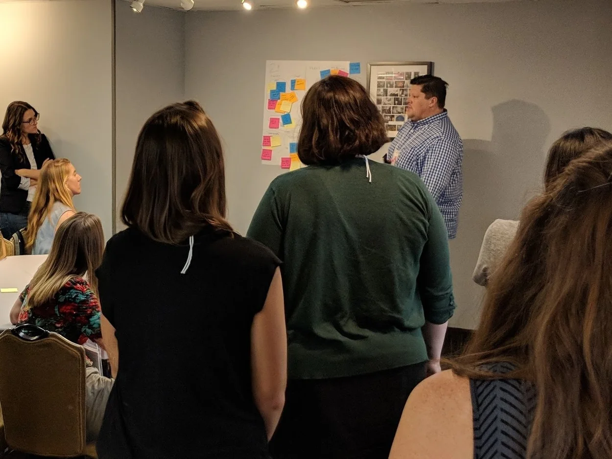 Sharing our group's findings with the class. Photo Credit: AIGA Seattle