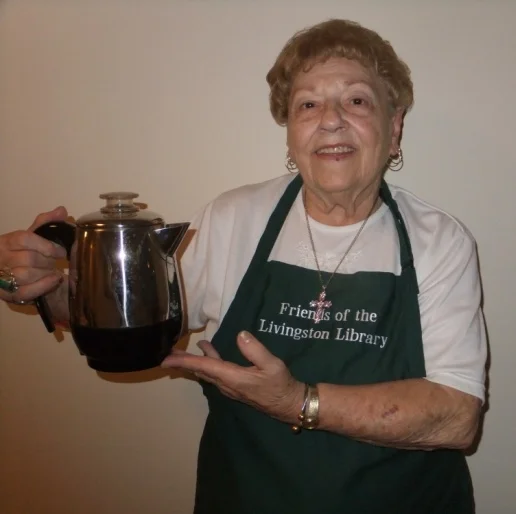 Friends Volunteers serve coffee and dessert each month at Senior Happenings. Pictured here is Marie.
