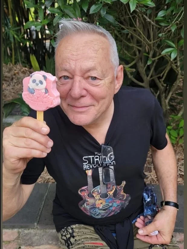 We have a new model shown here- wearing our band tee shirts, we think he looks quite handsome in it! 😎 @tommyemmanuelcgp we ❤️ YOU! thestringrevolution #tommyemmanuel #guitarplayers