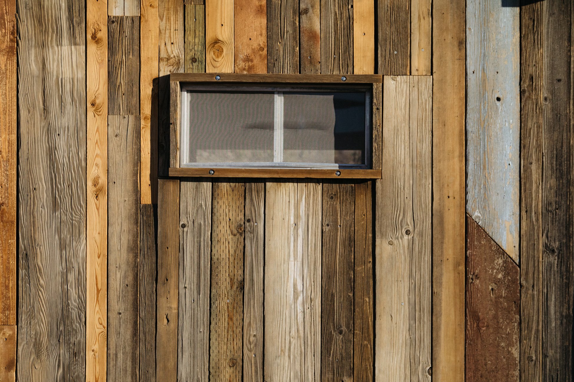  Salvaged wood siding. Photo by Mikayla Whitmore.  