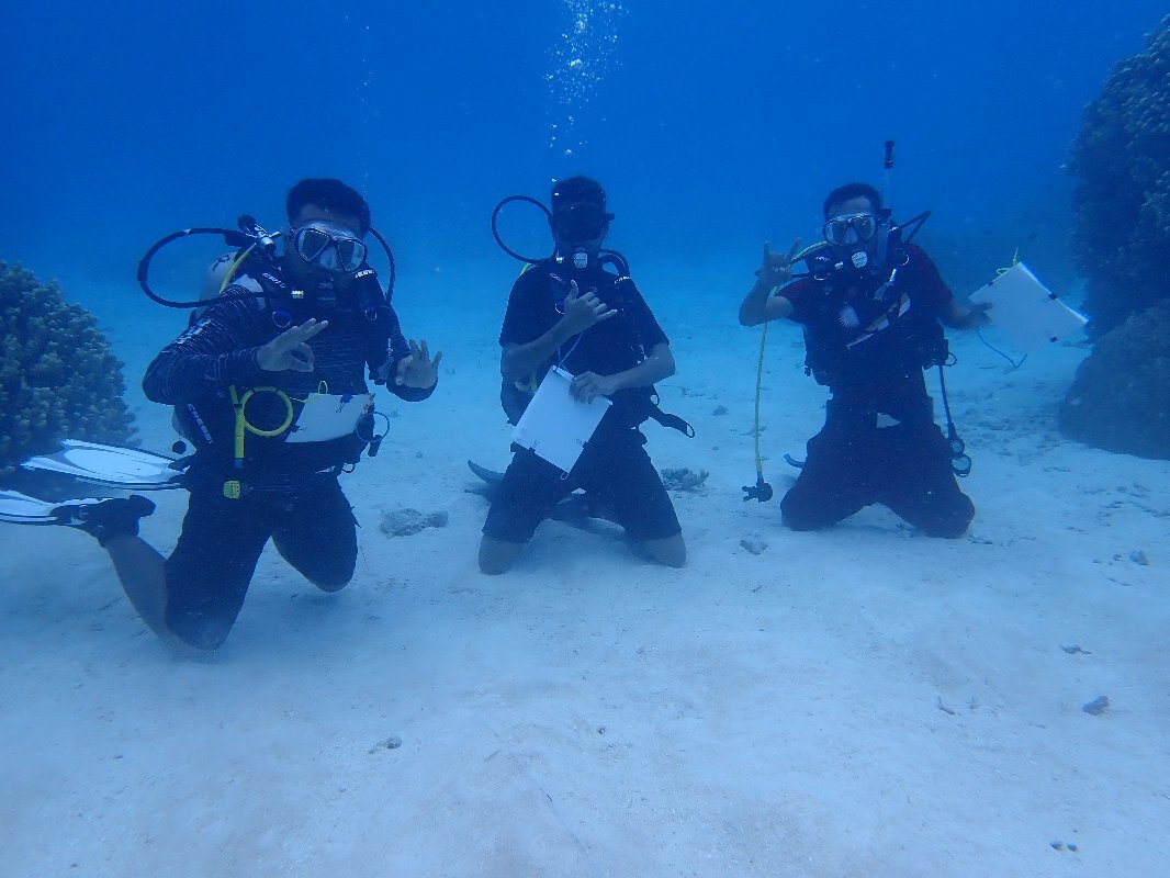  MICS Dive team takes a break during training to snap a group photo. 