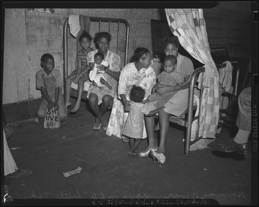  Residents of overcrowded Bronzeville  via  