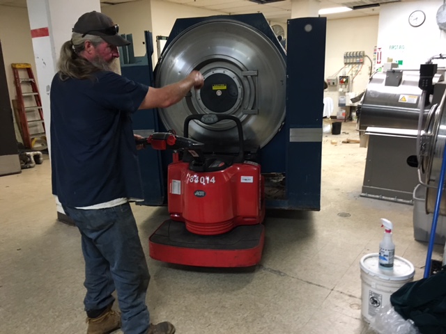 Coming out with an electric pallet jack. Note the top is missing.