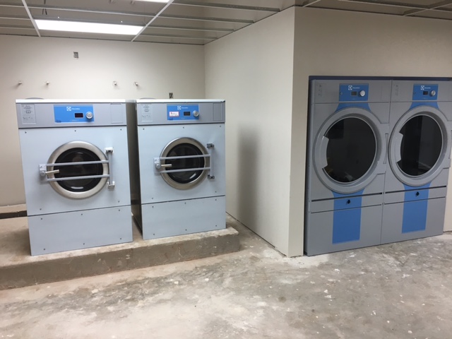 The washers are stainless steel fronts. The stickers have been left on during final construction.