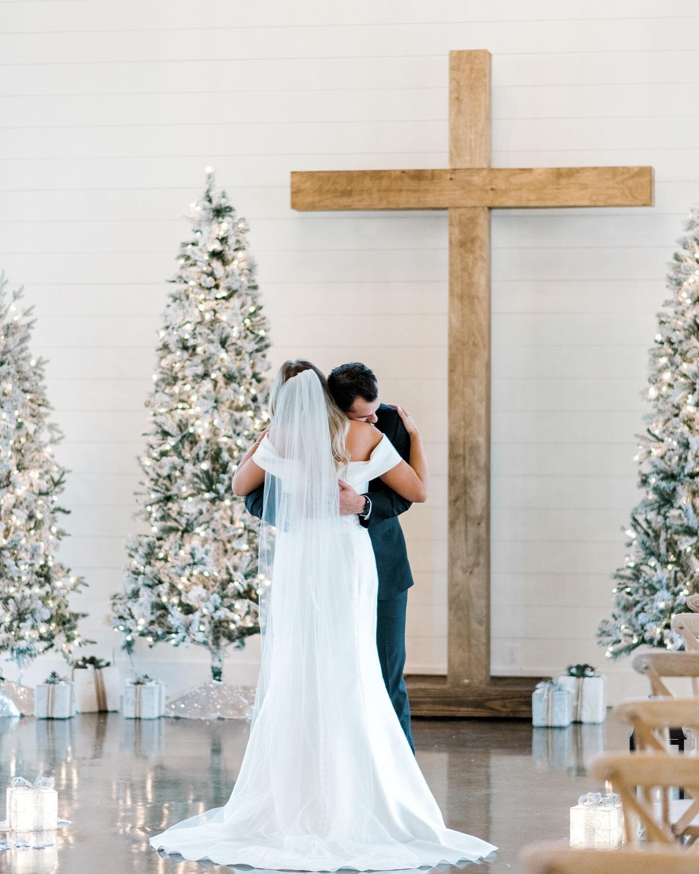 All my fave things in one photo: Christmas trees, first looks, and the sweetest bride and groom (and the cross of course bc JESUS!!)!!!