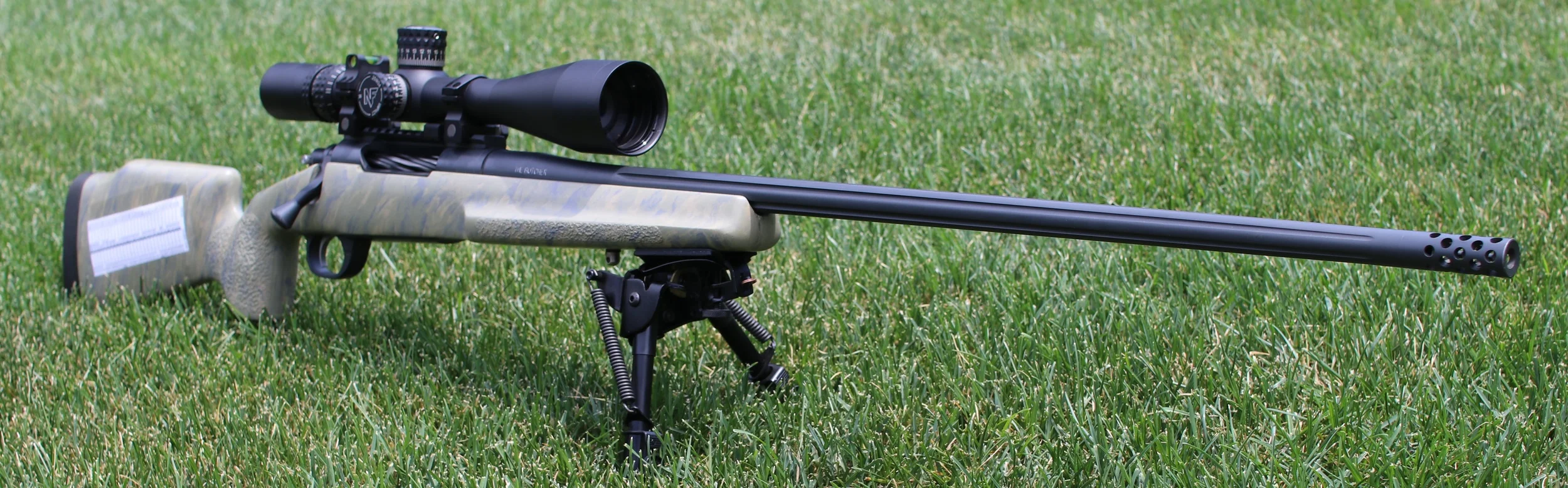 Complete, with bipod and dope chart.
