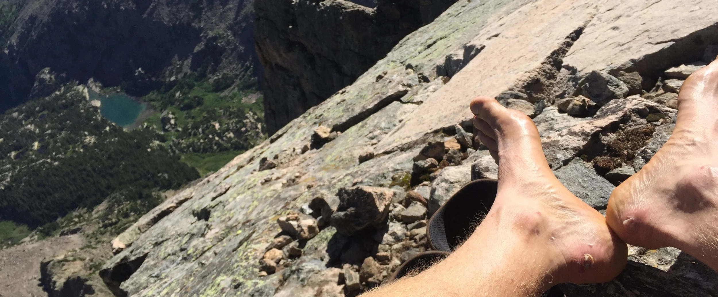 Don't look down! Rather, look closely at my heels. 14,000 feet is a bad place to get blisters. The Zamberlan Outfitters felt OK at home, until I put some miles on them.