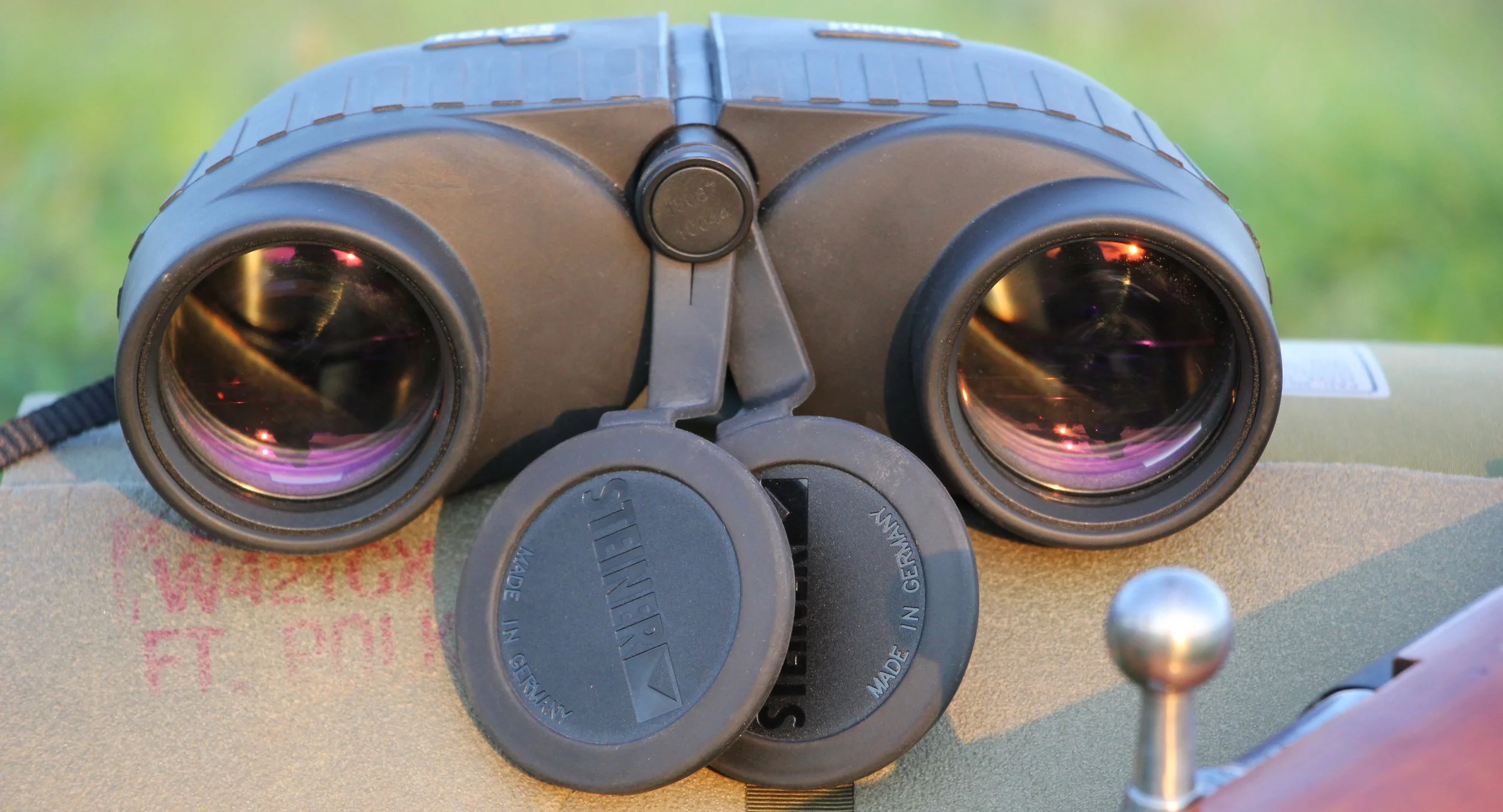 Balman needed a binocular with large objective lenses for good low light performance.
