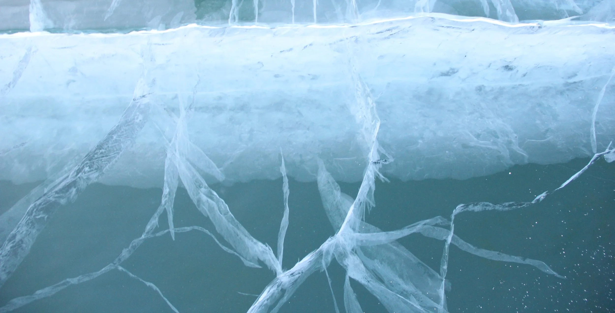 Clear ice and the river below
