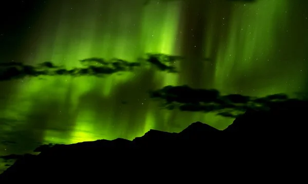 Northern lights over the spine of the Mackenzies