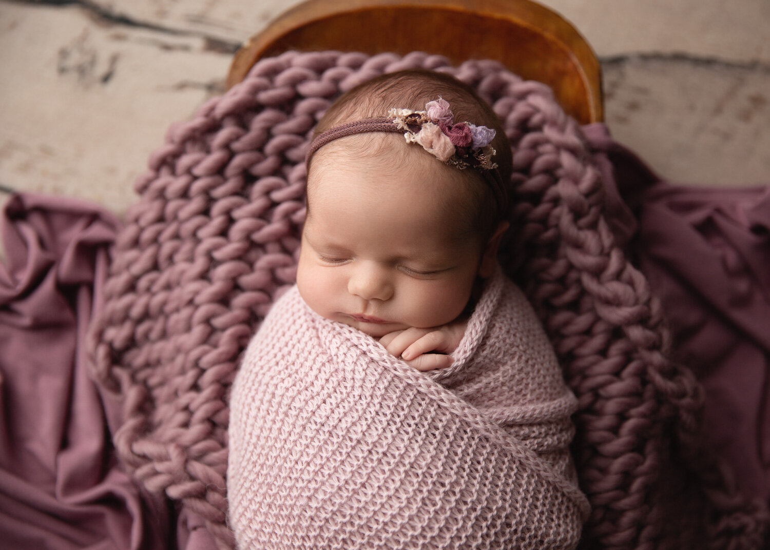  Soft mulberry toned wrap and wool stuffer used for prop set up for newborn baby girl in Winnipeg for photoshoot 