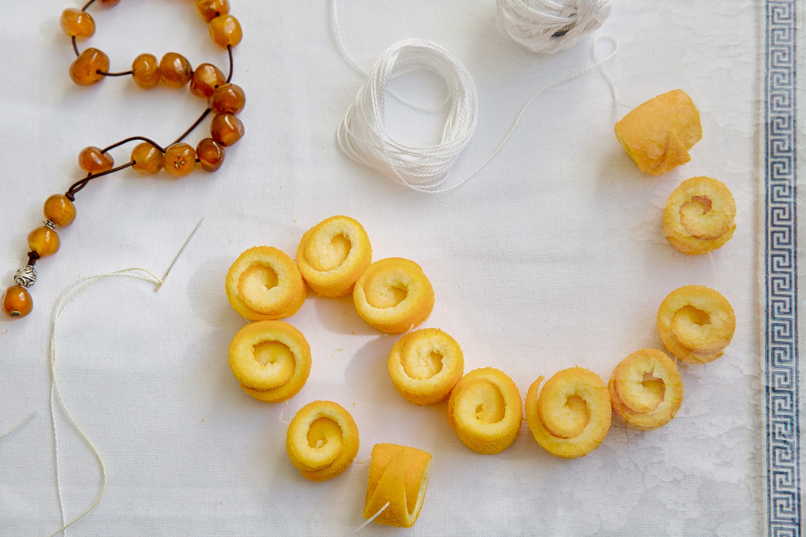 OrangePeels_SpoonSweets_Gliko_Sladko_WhiteThread_GoldenEarNeedle_GreekAmberRosary_StringOfOrangePeelsBeads_MeanderOrnament_Meandros_SophiaTerraZiva