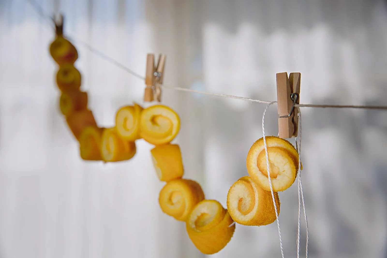 OrangePeels_SpoonSweets_Gliko_Sladko_WhiteThread_GoldenEarNeedle_StringOfOrangePeelsBeads_WashingLine_Pegs_SophiaTerraZiva