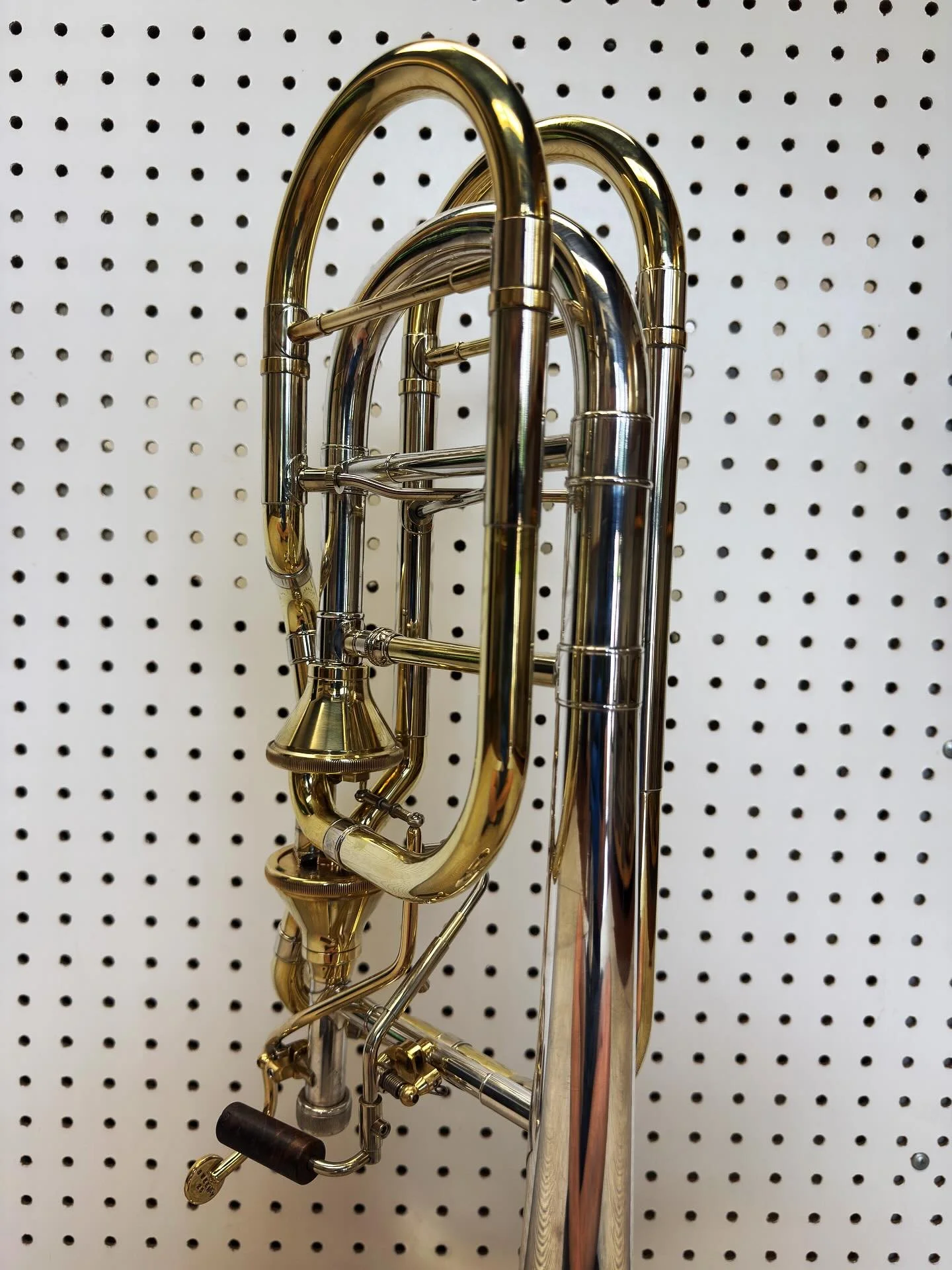 Can barely fit all the tubing in 1 shot! I recently rebuilt this Bach Bass Trombone and outfitted with new Instrument Innovations axial valves and valve wraps, custom bracing, and triggers. Swipe to the last pic to see where it started… It&rsq