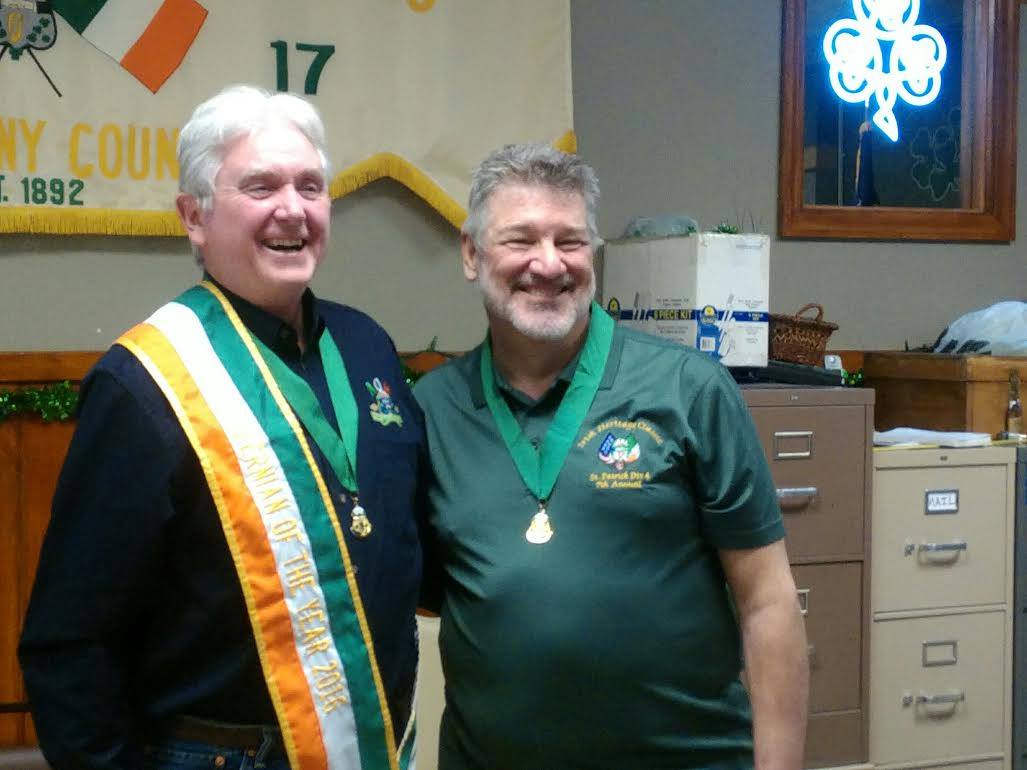 Denny Maher receiving his Hibernian of the Year award from AOH Allegheny County Board President Steve Kurpiewski.