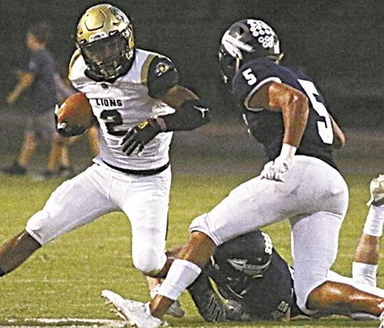 Jordan Jackson Loganville Christian's Jordan Jackson (2) shakes off the tackle from Nathan Yokley (25) of Brookwood as Mac Brandon (5) gives chase Friday night, Sept. 20, 2019, in Thomasville, Ga.