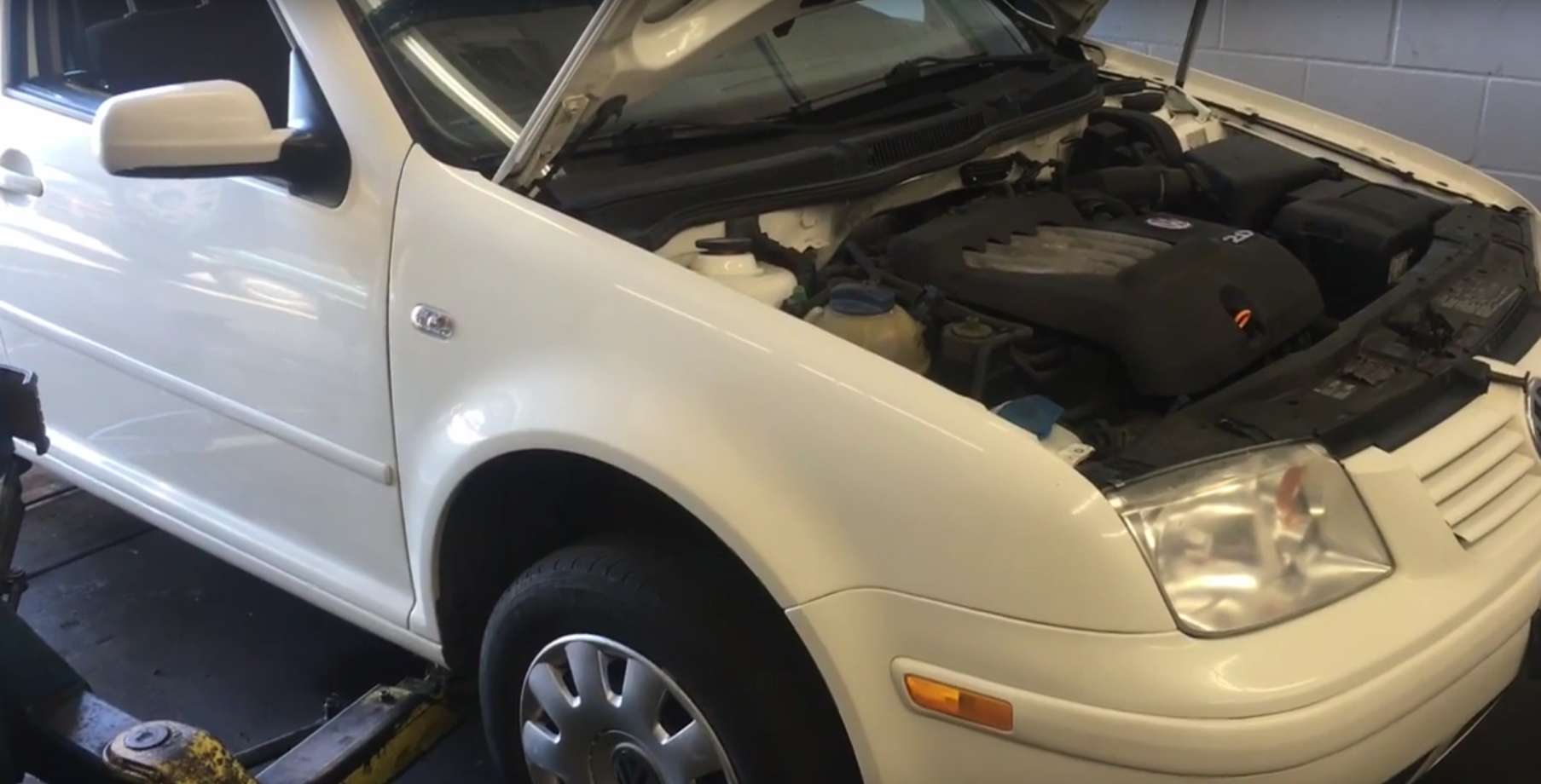 How to Replace the Coolant Housing and Temp Sensor on a 2003 Volkswagen Jetta 2.0 L Engine