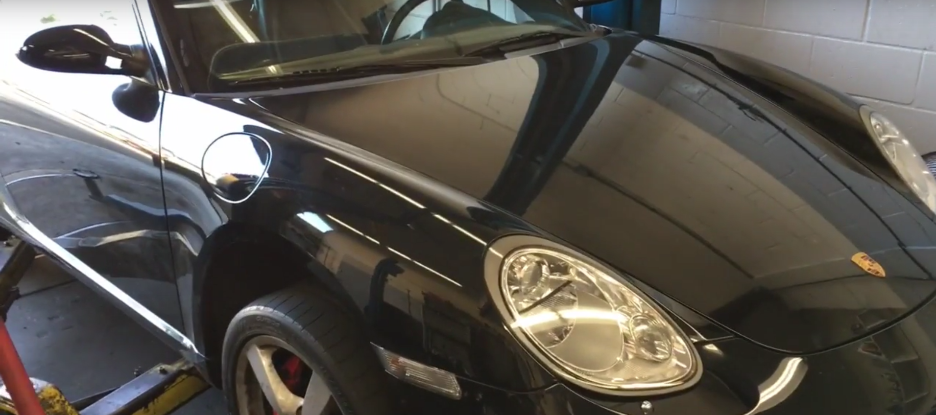 how to open a car hood with a dead battery