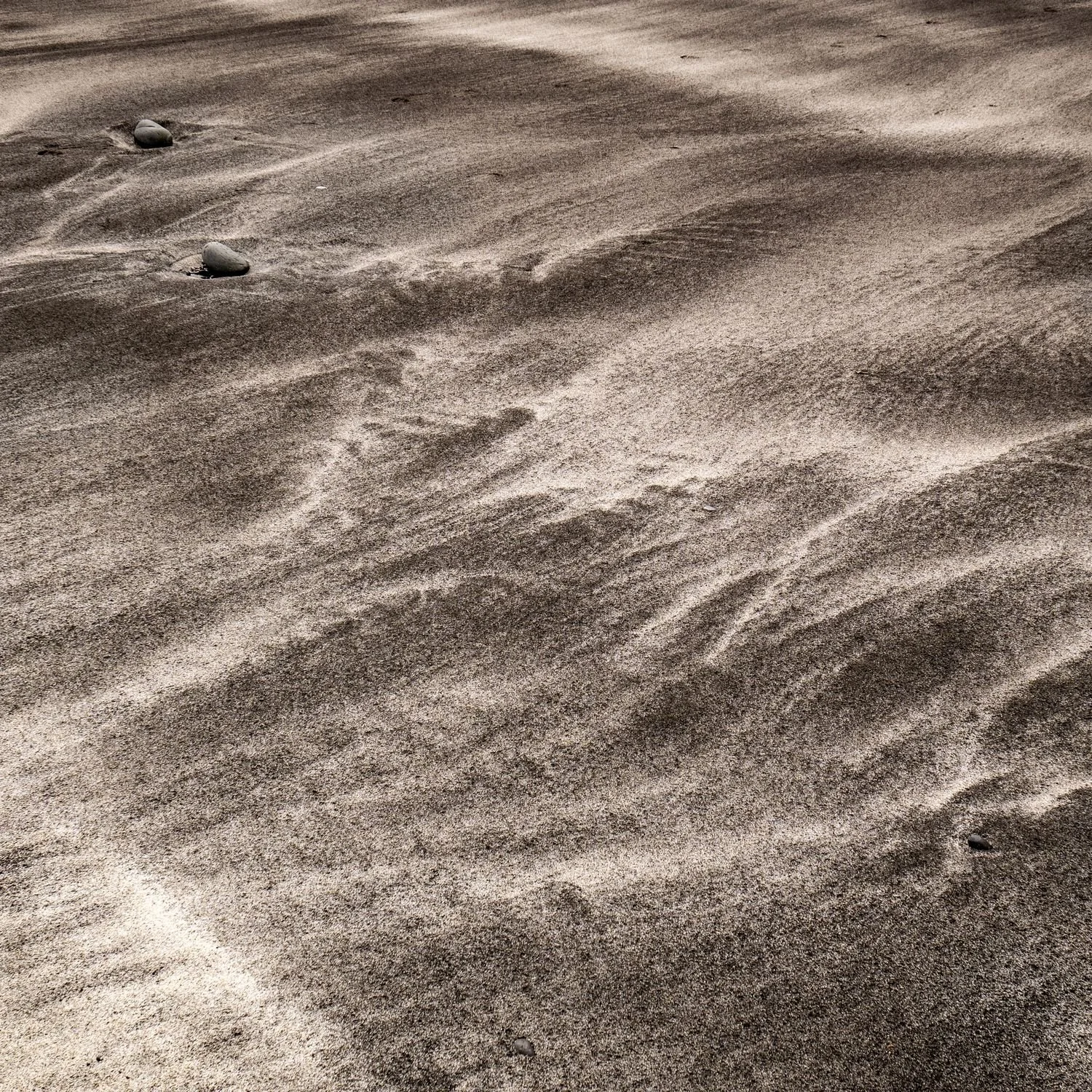 Sand patterns, Talisker Beach,  Isle of Skye, Scotland. Contrasting black and white sand creates ever shifting patterns at Talisker Bay.
