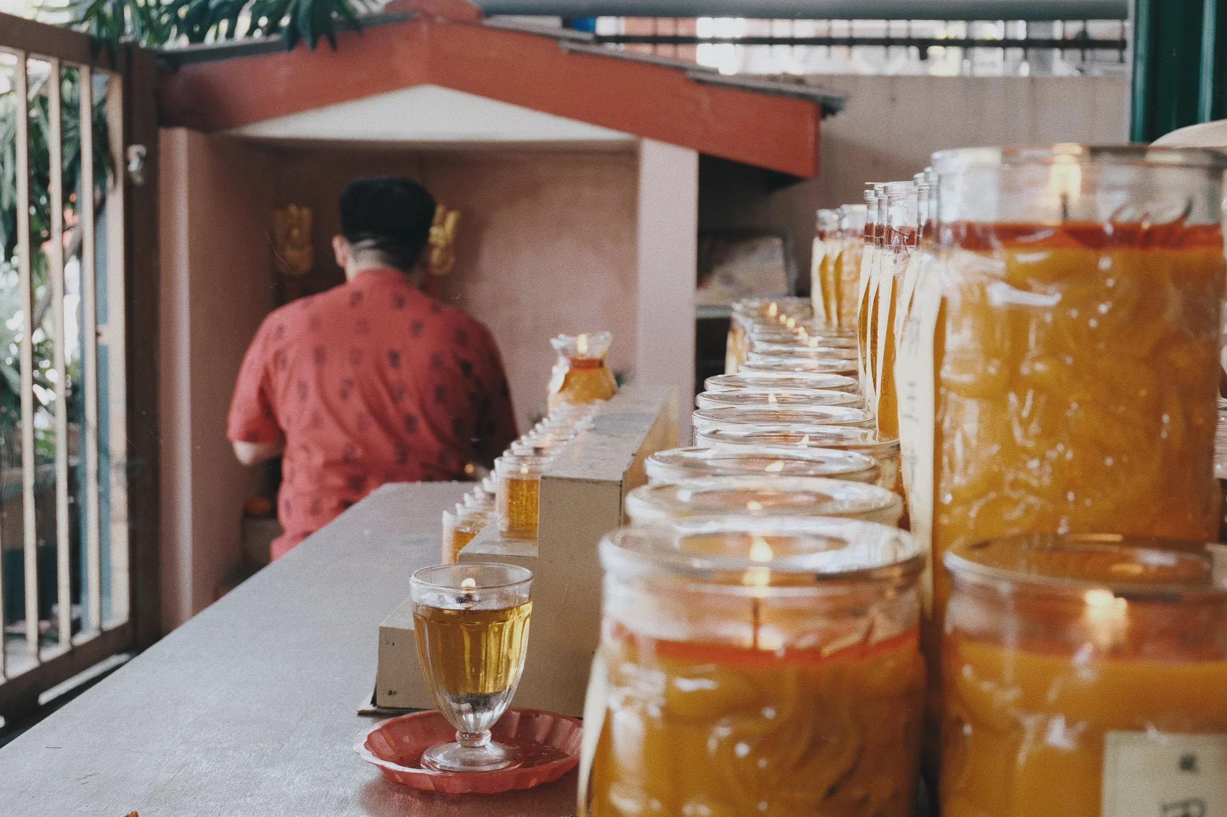 Strangers paying respect to their ancestors at the temple. 