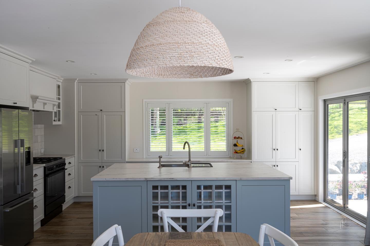 A traditional black board &amp; batten style home looking out over rolling hills where the owners, who just purchased the house, were open to make some big changes as the existing living - kitchen space had an awkward lay out  and wasn&rsquo;t suitab