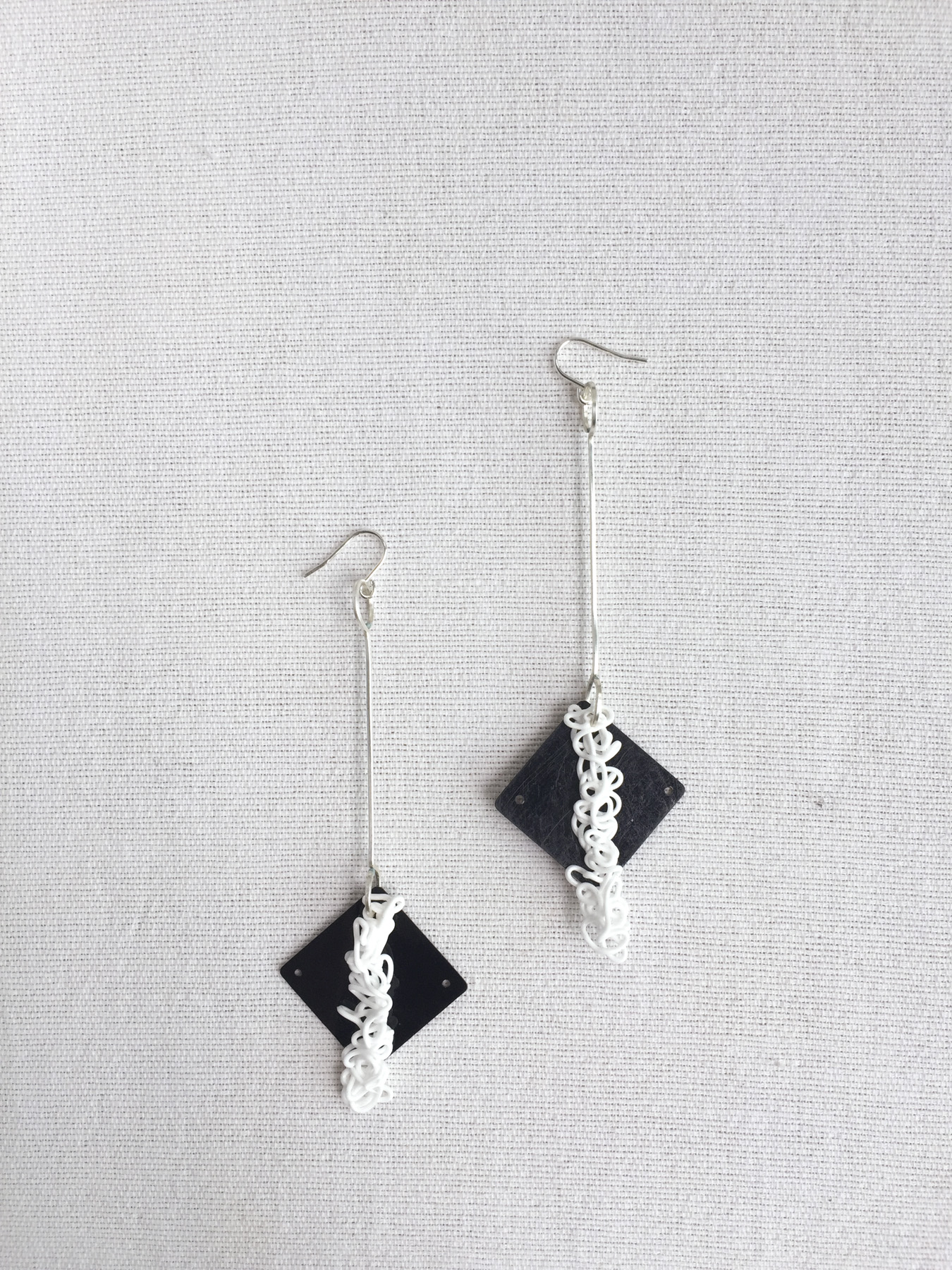 diamond squiggle earrings.jpg