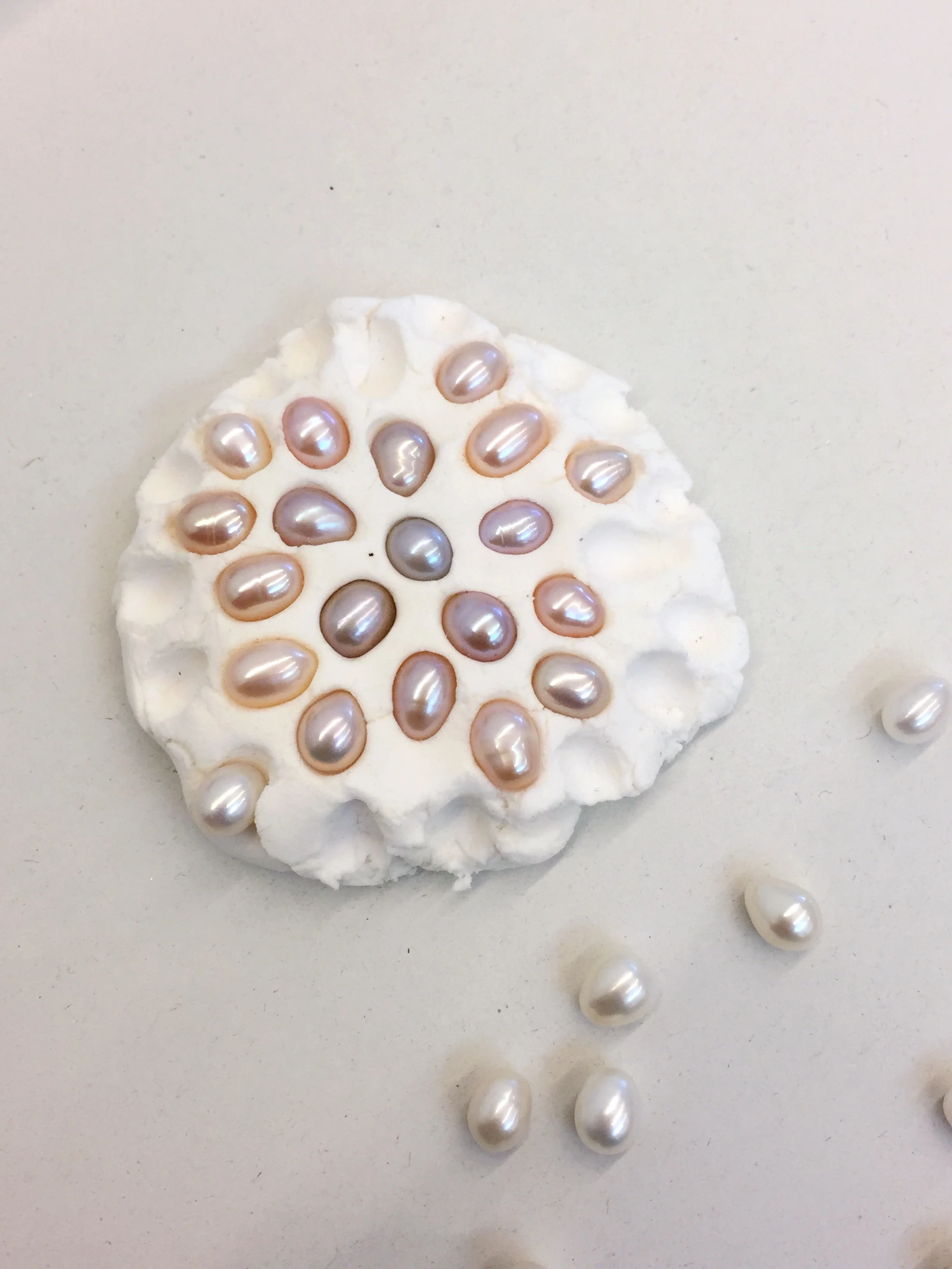 Pearl in clay