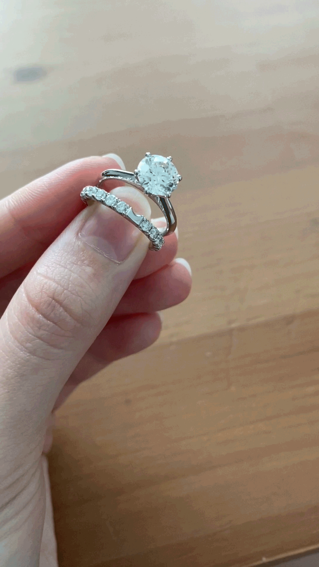 french set diamond stacking wedding ring with engagement ring.gif