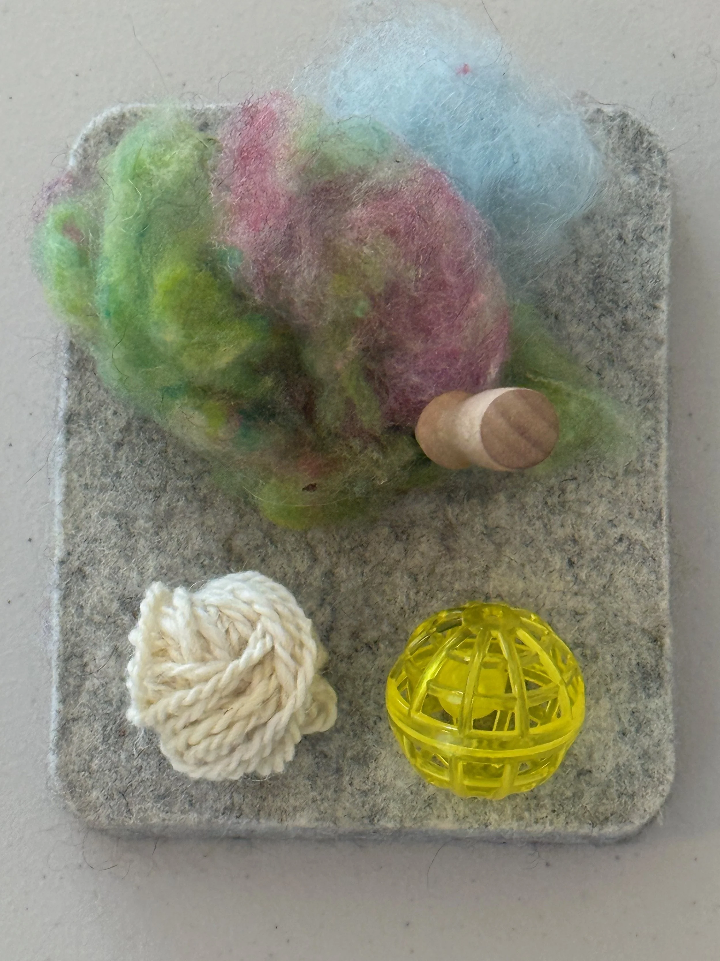materials to make a felted cat ball
