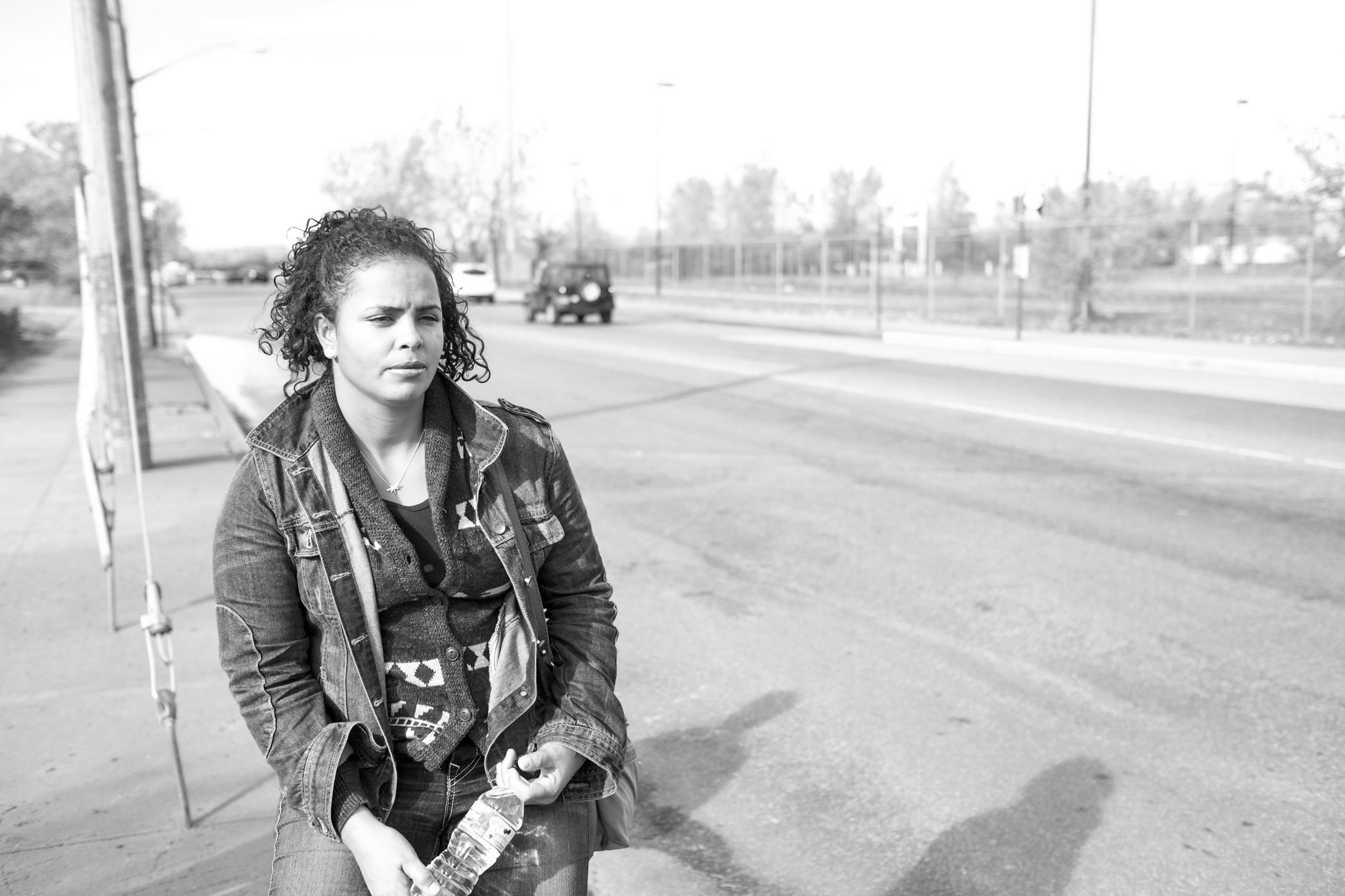 Evelyn waiting for the bus. Flushing, NY (2014) 