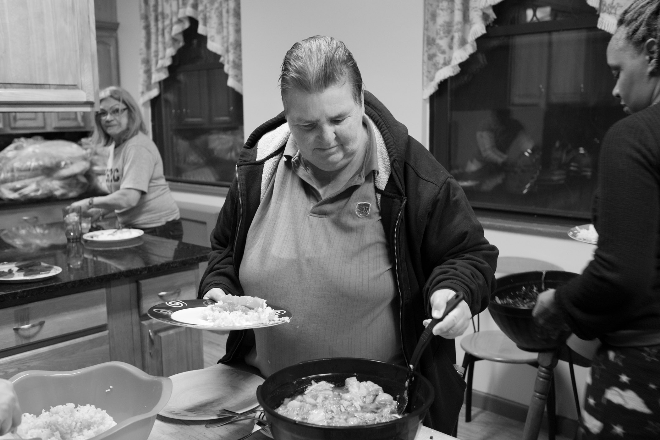 Communal dinner in Carol’s transitional housing. Long Island City, NY (2015)