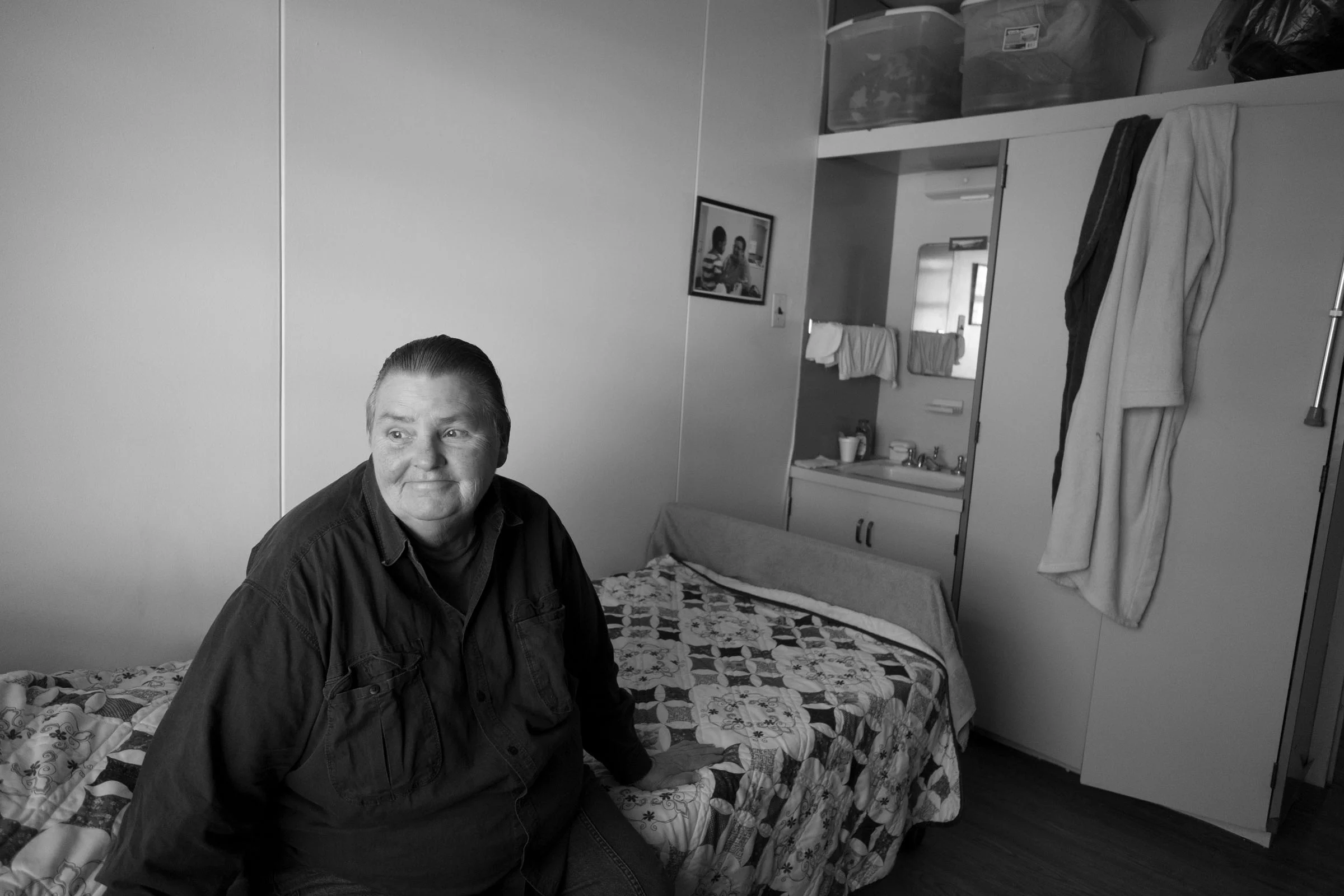 Carol in her bedroom. Long Island City, NY (2017)