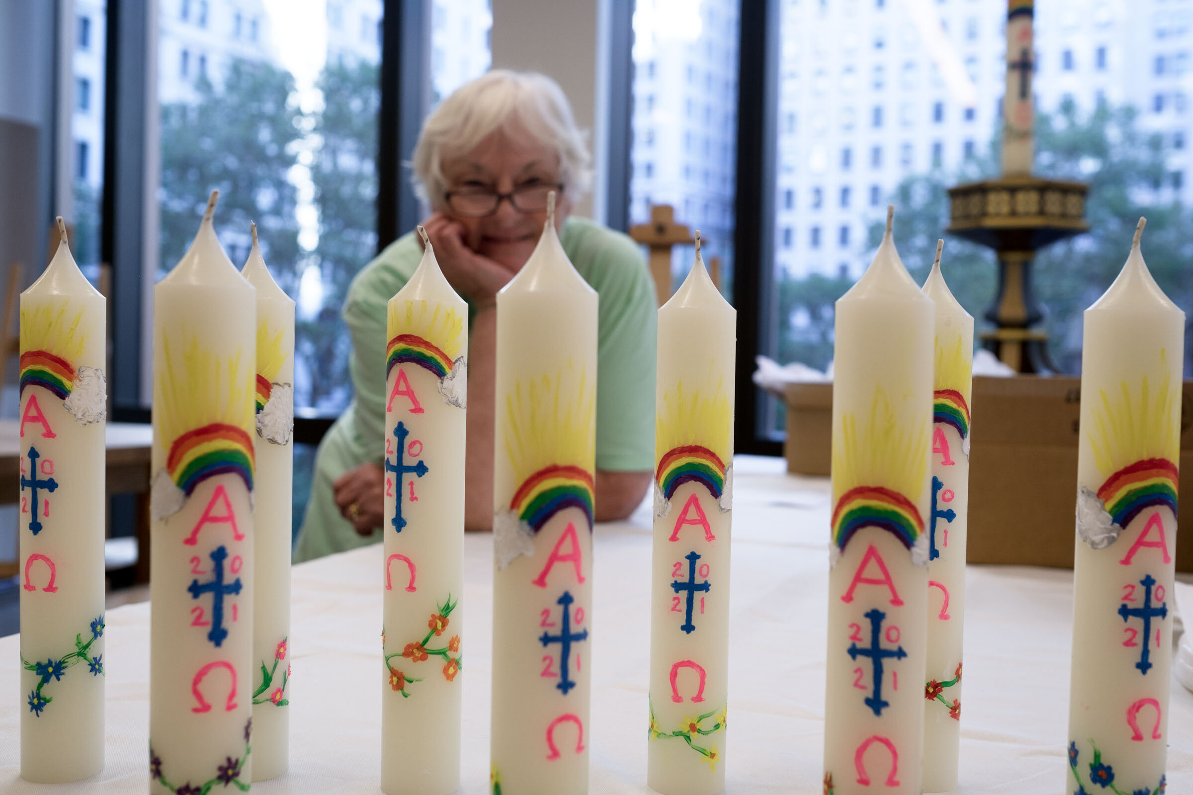 Karen hand-paints candles for an upcoming baptismal ceremony at Trinity Church. New York, NY (2021)