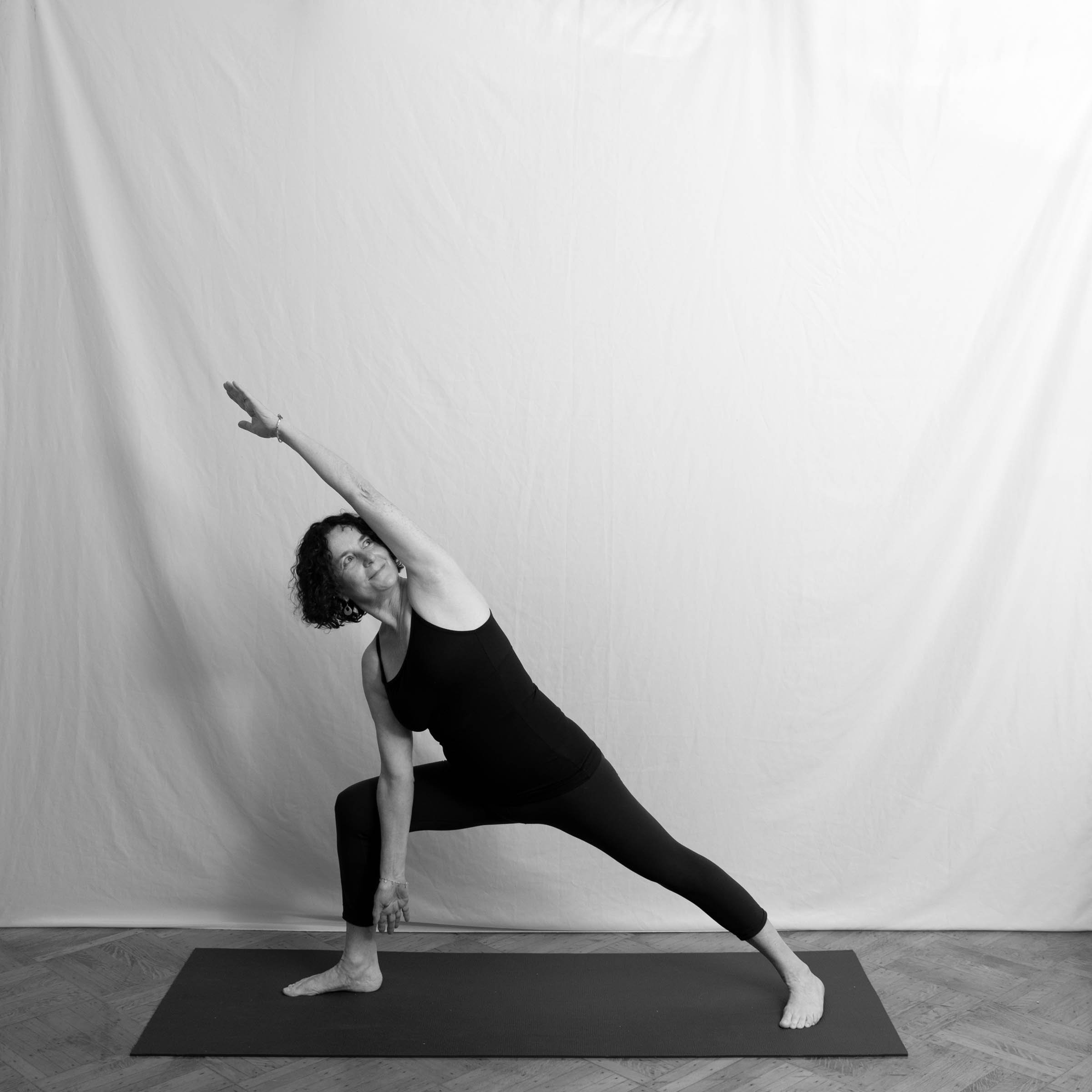 SARA BENNETT, 67 (photographer). Practicing yoga for 14 years.