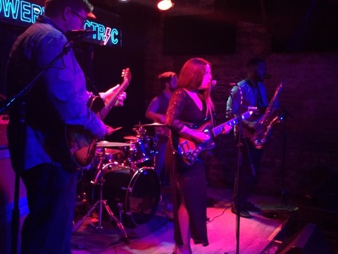 Kim Logan performs downstairs at The Bowery Electric. Photo credit by Jessica Klausing