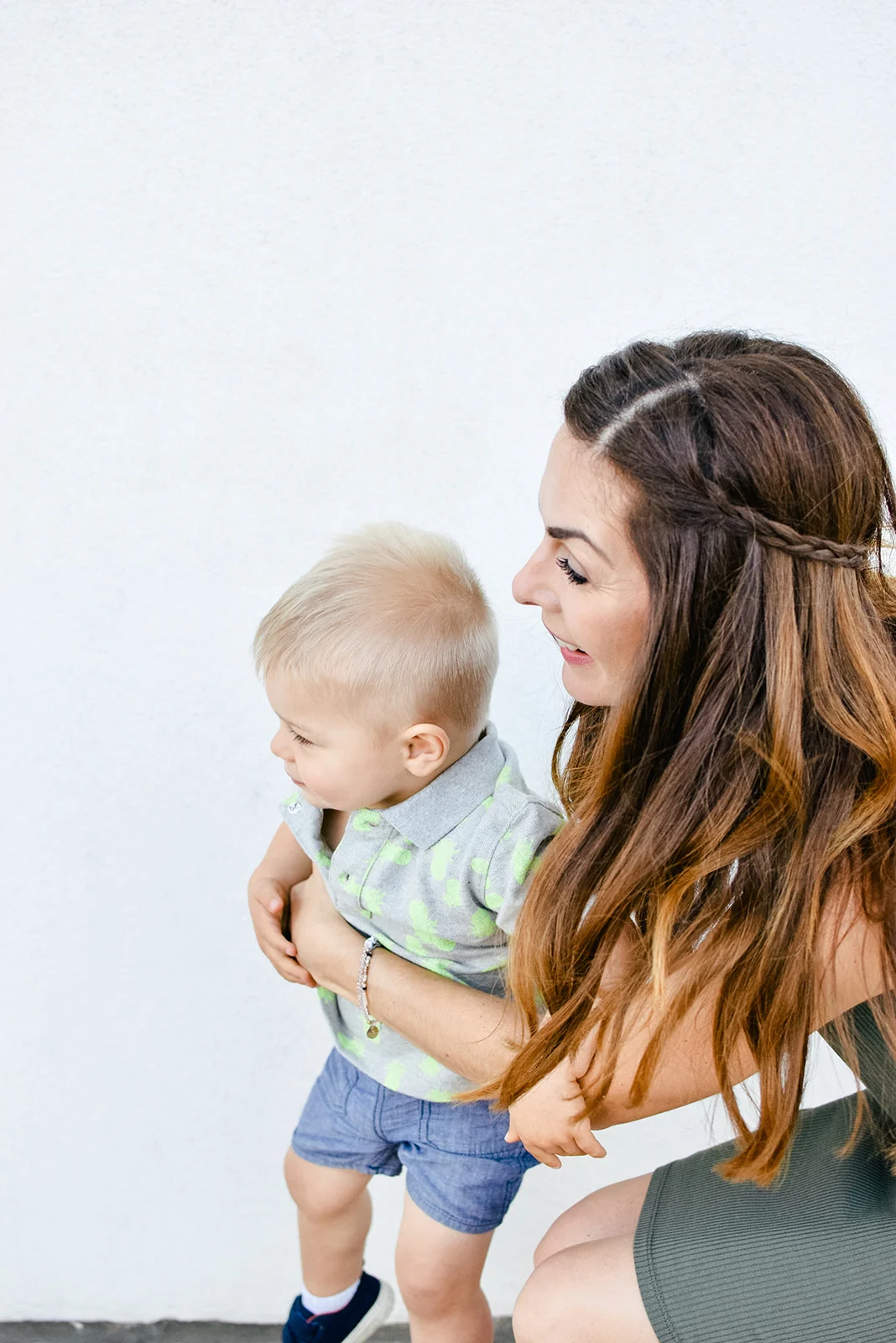 Life of a toddler mom! He wants to go-go-go, and I want to hold on just a minute longer! Short embrace captured by Brenda Marie Winburn Photography