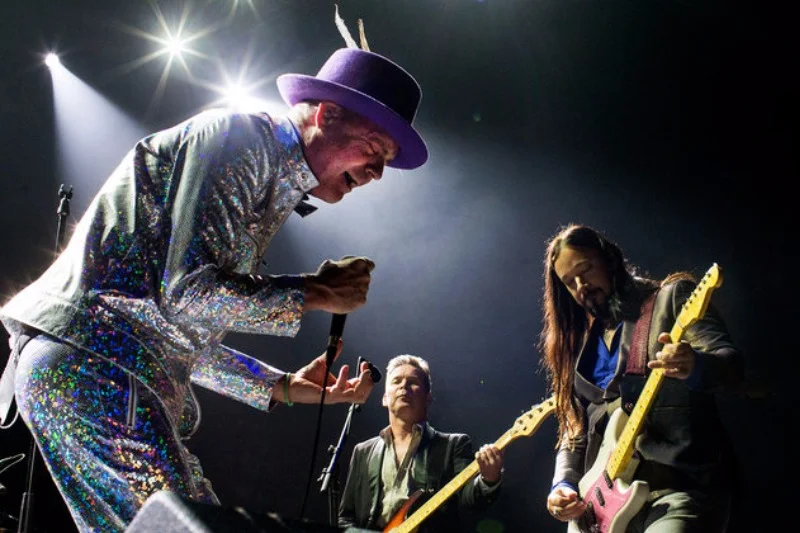 Gord Downie performs with bandmates Gord Sinclair and Rob Baker.