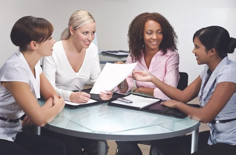 Networking-women-at-table-royalty-free.jpg